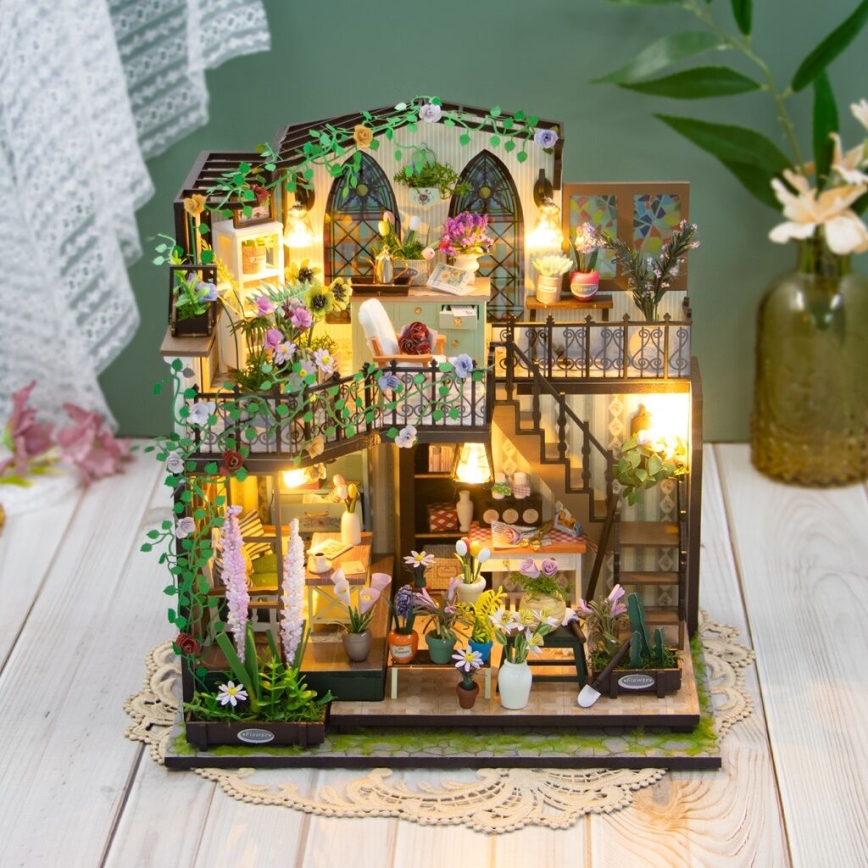 2Kids Toys - Miniatura de casa Darcyin casa floral 2xAAA