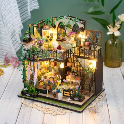 2Kids Toys - Miniatura de casa Darcyin casa floral 2xAAA