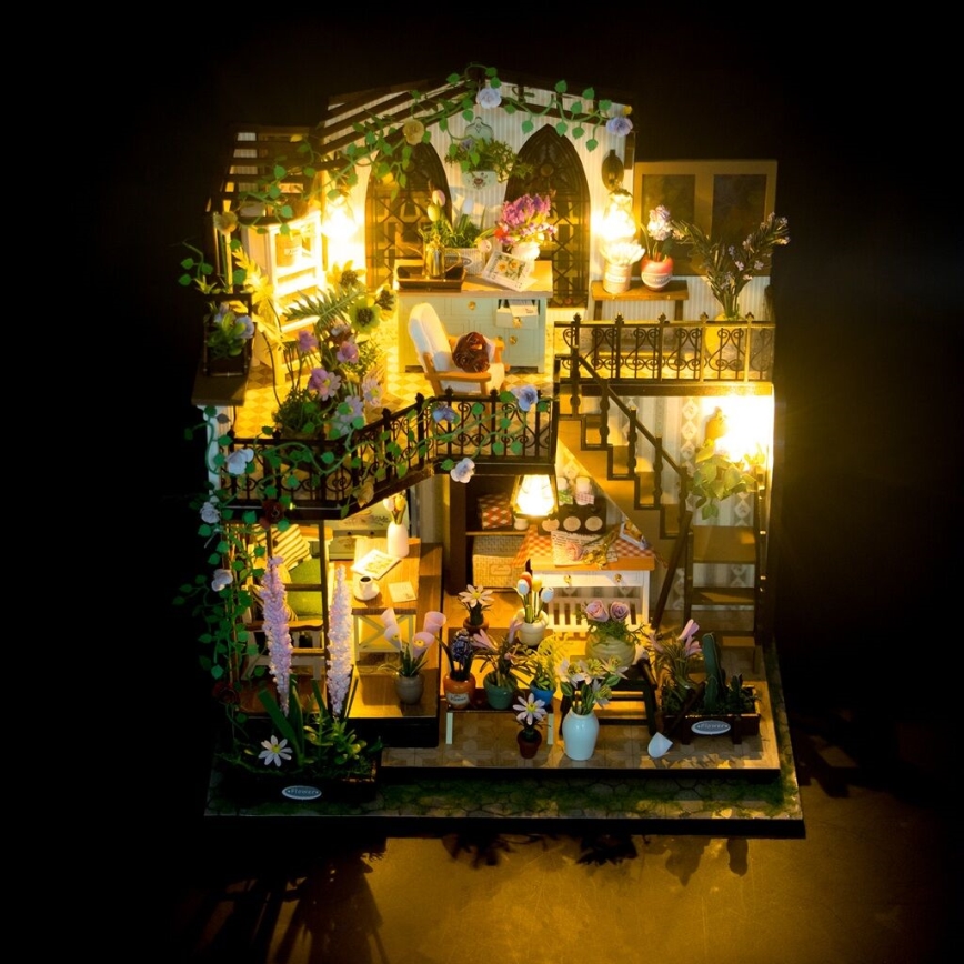 2Kids Toys - Miniatura de casa Darcyin casa floral 2xAAA