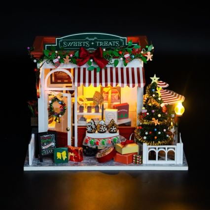2Kids Toys - Miniatura de casita Dulcería Navideña 2xAAA