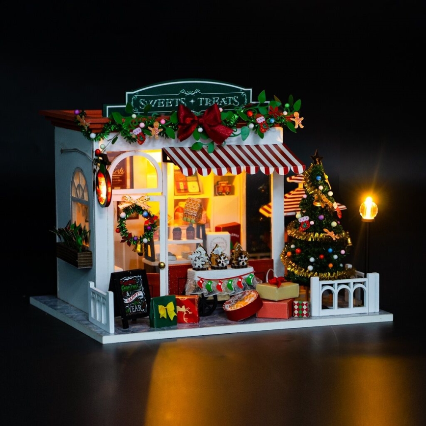 2Kids Toys - Miniatura de casita Dulcería Navideña 2xAAA