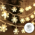 Aigostar - Cadena de luces de Navidad LED 20xLED/3xAA 3,3m copos de nieve