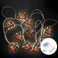 Aigostar - Cadena de luces LED navideña 10xLED/3xAA 1,5m blanco cálido con trineos