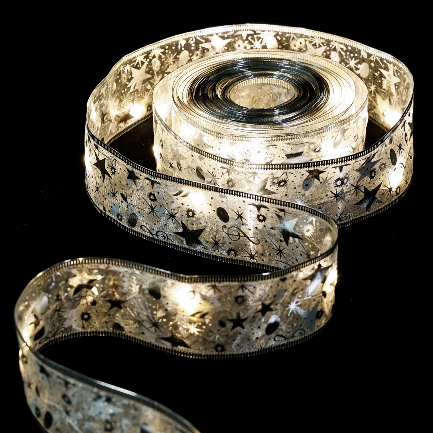 Aigostar - Guirnalda LED de Navidad, 50 LED, 5 m, blanco cálido, plateada, funciona con 3 pilas AA