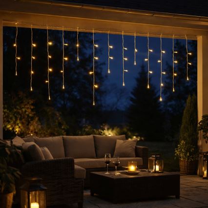 Aigostar - Guirnalda navideña LED para exterior 300 LEDs/8 funciones 3x AA 18x0,6 m IP44 blanco cálido