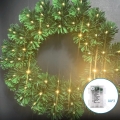 Aigostar - Guirnalda navideña LED para exterior, 72 LEDs, alimentada por 3x pilas AA, diámetro 50 cm, IP44, blanco cálido