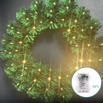 Aigostar - Guirnalda navideña LED para exterior, 72 LEDs, alimentada por 3x pilas AA, diámetro 50 cm, IP44, blanco cálido