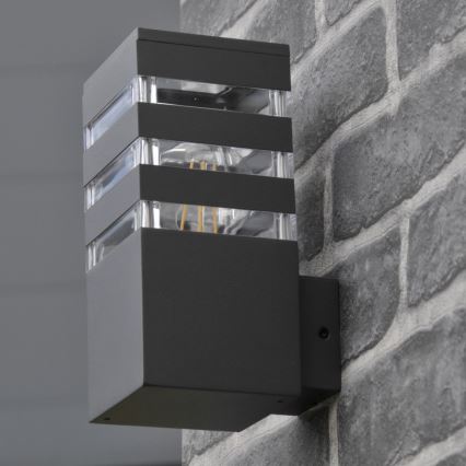 Aplique de pared exterior LED RGBW regulable TEKSAS 1xE27/12W/230V 2700-6500K Wi-Fi IP44 antracita