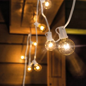 Brilagi - Cadena decorativa LED para exterior GIRLANDA 10xE12/0,6W/230V 8m blanco IP44 blanco cálido