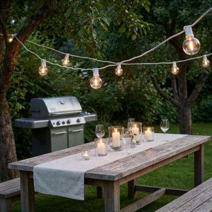 Brilagi - Cadena decorativa LED para exterior GIRLANDA 10xE12/0,6W/230V 8m blanco IP44 blanco cálido