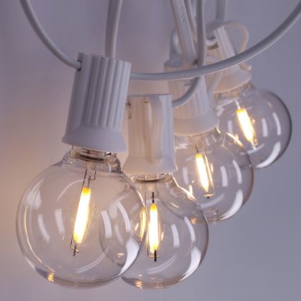 Brilagi - Cadena decorativa LED para exterior GIRLANDA 10xE12/0,6W/230V 8m blanco IP44 blanco cálido
