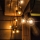 Brilagi - Guirnalda decorativa LED para exterior GIRLANDA 18xE12/0,6W/230V 13m negra IP44 blanco cálido
