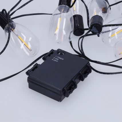 Brilagi - Guirnalda LED para exteriores, 10 LEDs / 3x AA, 3,2 m, IP44, blanco cálido