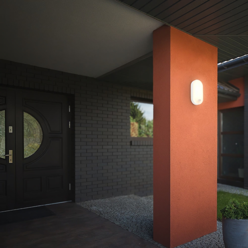 Brilo - Aplique de pared LED para exterior con sensor de movimiento y sensor crepuscular RUCH LED/12W/230V IP65 blanco