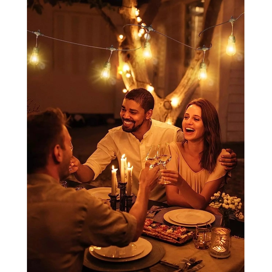 Cadena decorativa LED para exteriores BAJA ST64 20xE27/1W/230V 20,9m IP44 blanco cálido