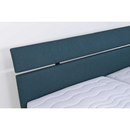 Cama tapizada ALIS 160x200 cm con colchón y práctico espacio de almacenamiento en azul petróleo