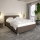 Cama tapizada con espacio de almacenamiento y colchón DALMA 140x200 cm, gris/marrón