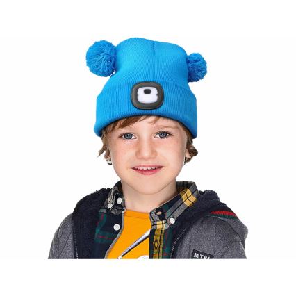 Extol - Gorro con luz frontal y carga por USB, batería recargable de 250 mAh, azul con pompones, talla infantil