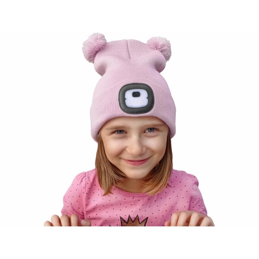 Extol - Gorro infantil con luz frontal recargable por USB (batería 250 mAh), rosa con pompones