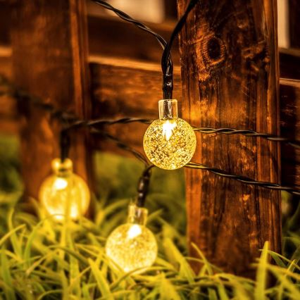 Guirnalda solar decorativa LED 30xLED/8 funciones 500 mAh 6,5 m IP67 blanco cálido