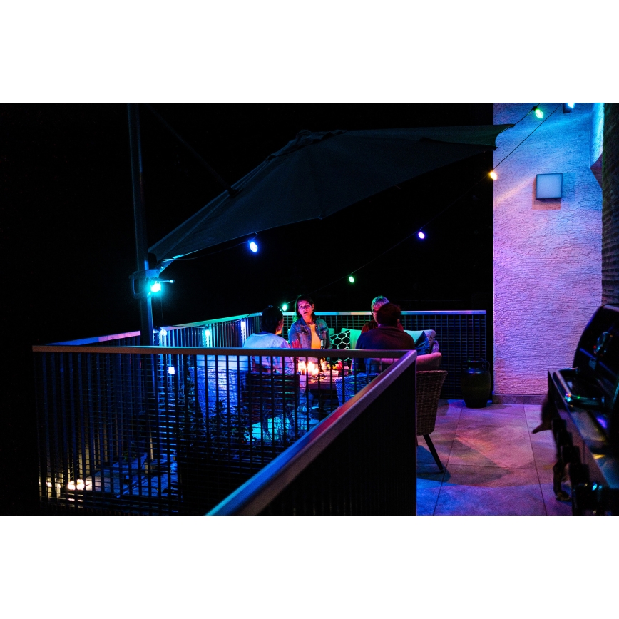 LED RGB+CCT Cadena de exterior regulable GARLAND 15xLED/1W/230V 15m Wi-Fi Tuya IP65 + control remoto