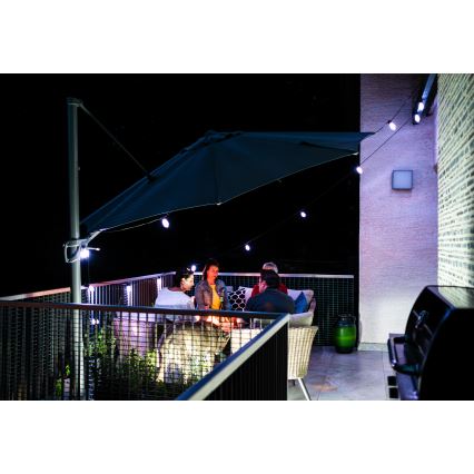 LED RGB+CCT Cadena de exterior regulable GARLAND 15xLED/1W/230V 15m Wi-Fi Tuya IP65 + control remoto
