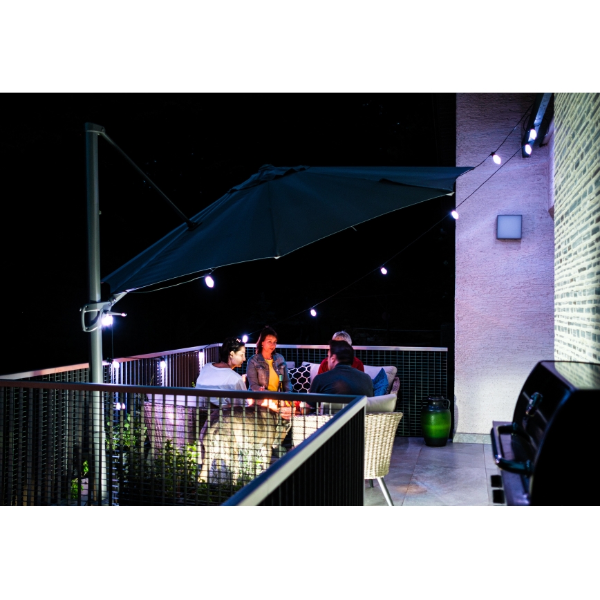 LED RGB+CCT Cadena de exterior regulable GARLAND 15xLED/1W/230V 15m Wi-Fi Tuya IP65 + control remoto