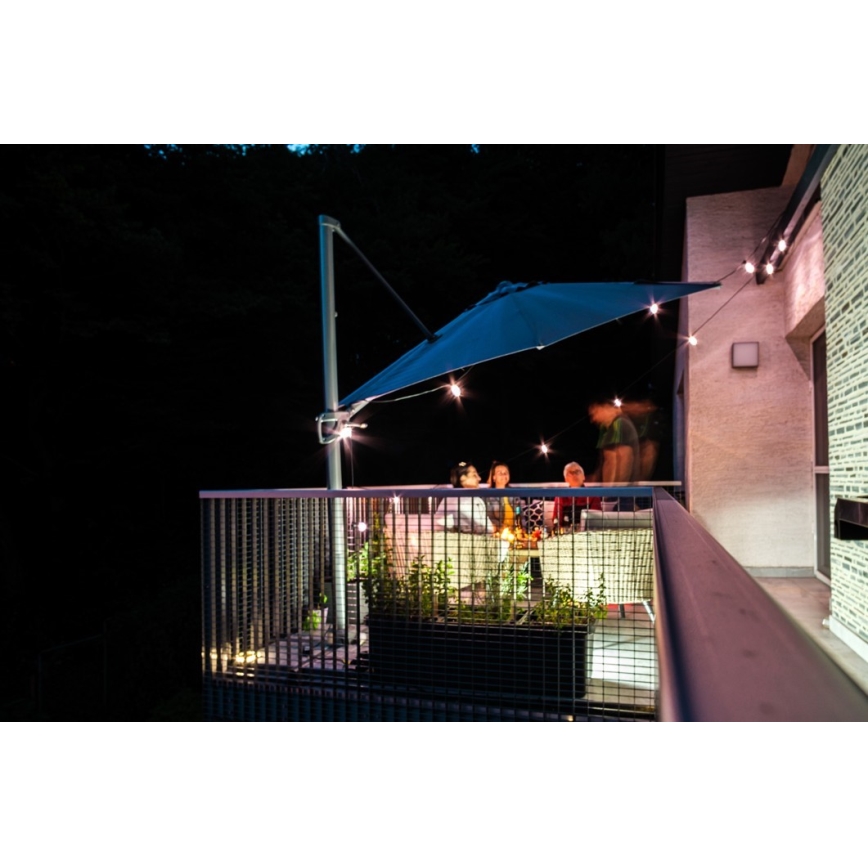 LED RGB+CCT Cadena de exterior regulable GARLAND 15xLED/1W/230V 15m Wi-Fi Tuya IP65 + control remoto