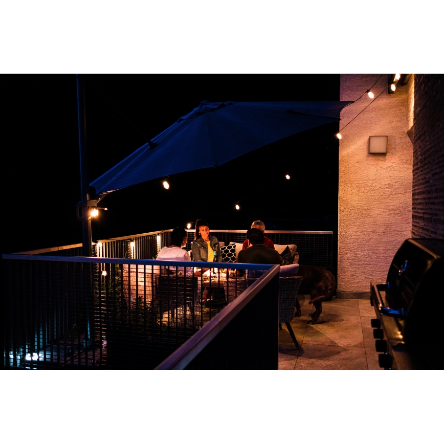 LED RGB+CCT Cadena de exterior regulable GARLAND 15xLED/1W/230V 15m Wi-Fi Tuya IP65 + control remoto
