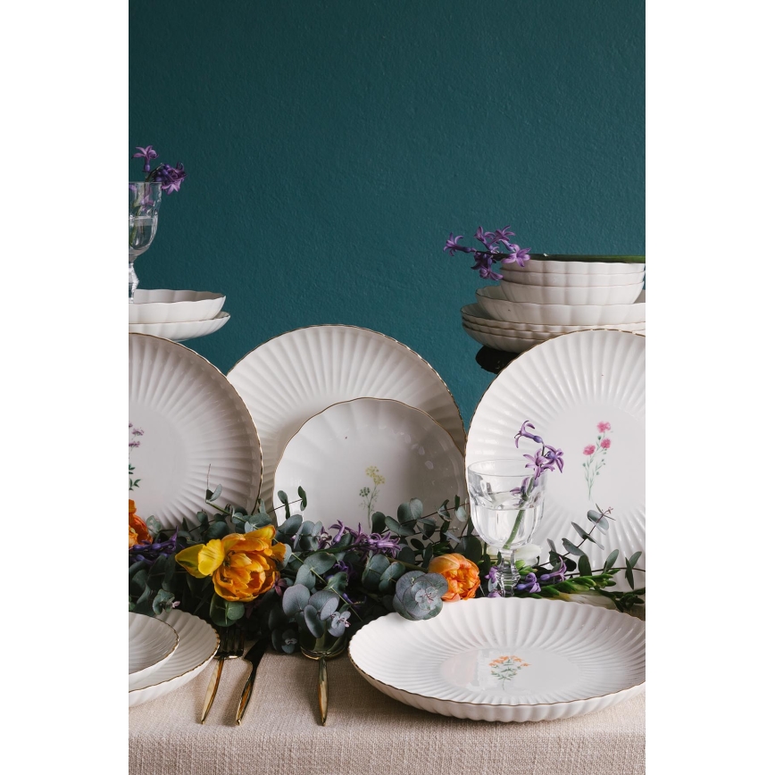 Juego de vajilla de 27 piezas en porcelana blanca con detalles dorados