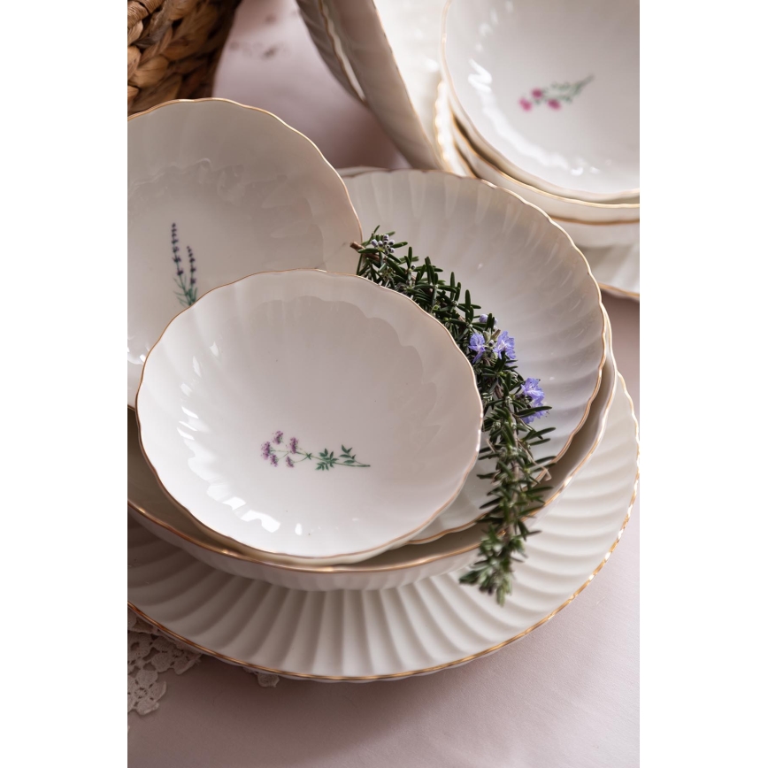 Juego de vajilla de 27 piezas en porcelana blanca con detalles dorados