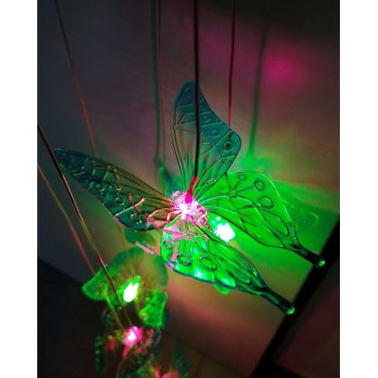 Lámpara solar LED RGB 6xLED/1,2V 300 mAh IP44 con diseño de mariposa