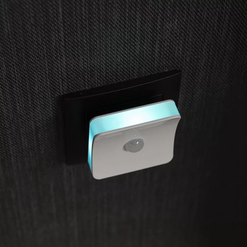 Ledvance - Lámpara orientativa LED RGB para enchufe con sensor LUNETTA LED/0,3W/230V