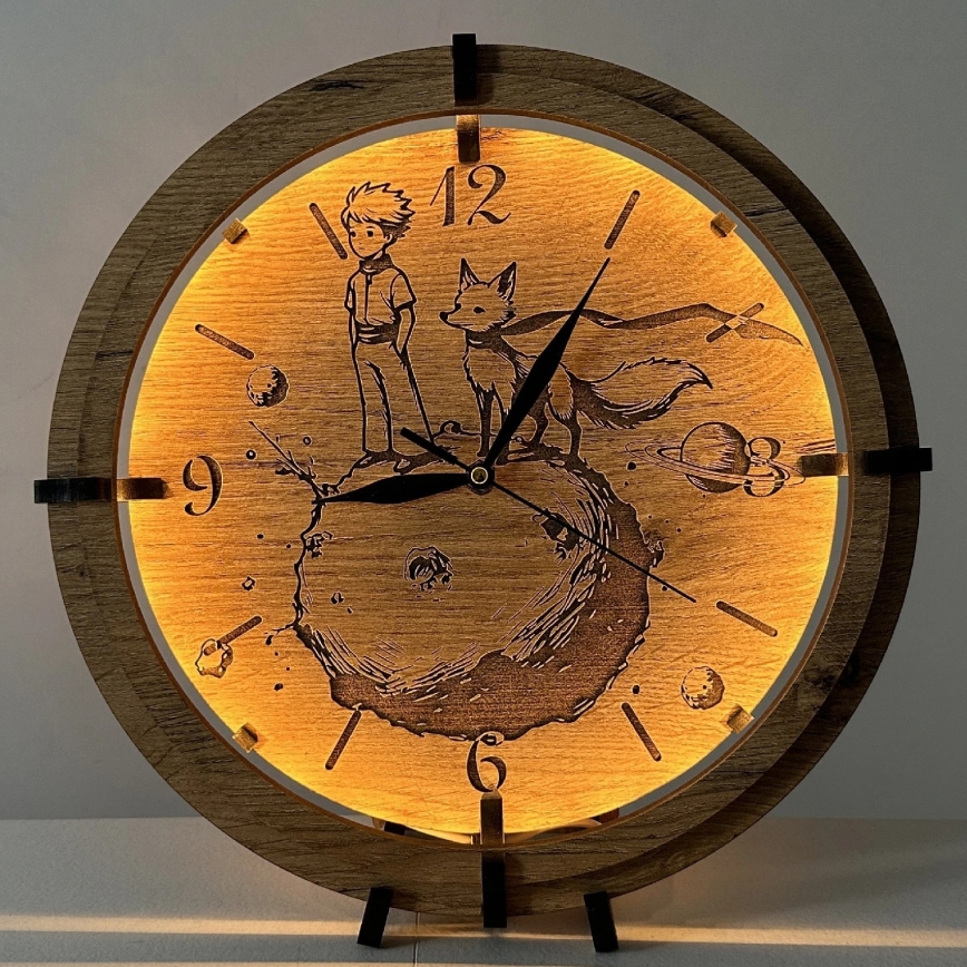 Li-Go 23712/DUB/BAT2 - Reloj LED regulable con sensor de movimiento LED/10W/5V 20000 mAh + 1xAA Ø 32 cm roble/El Principito