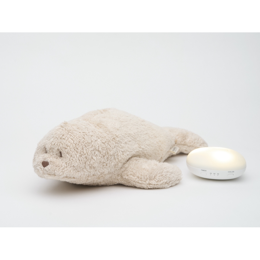 Moonie - peluche para dormir con melodía y luz, foca color Organic Sand
