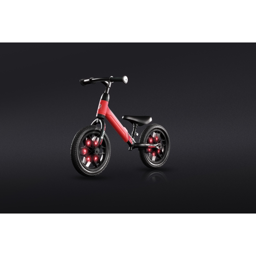 QPlay - Bicicleta de empuje con LED luces con ruedas SPARK rojo