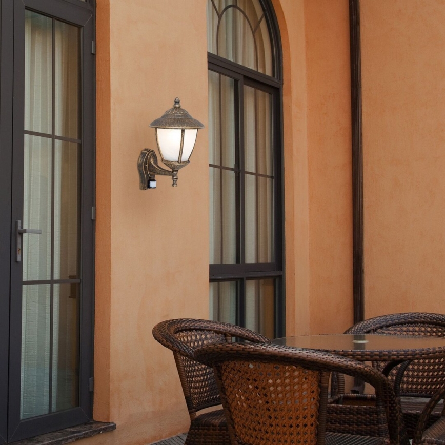 Rabalux - Lámpara de pared exterior con sensor 1xE27/60W/230V IP43 dorado