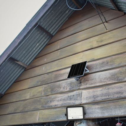 Reflector solar LED regulable LED/100W/3,2V 2000-8000K IP65 5000 mAh negro + mando a distancia