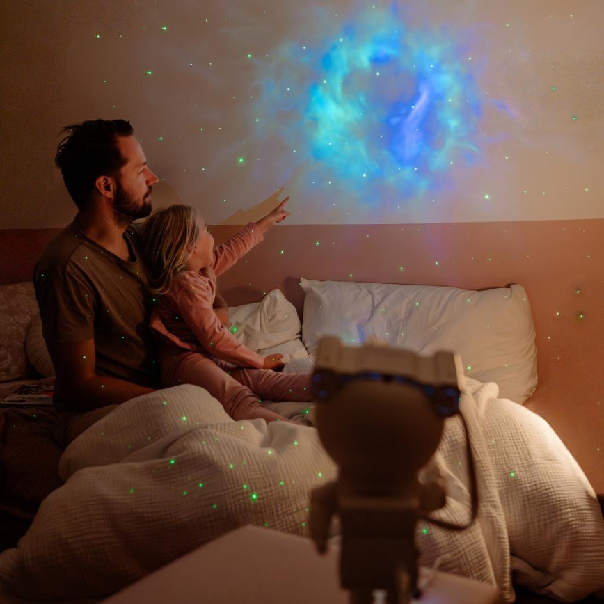 Retlux - Proyector infantil LED 230 V astronauta, 23,3 cm + mando a distancia