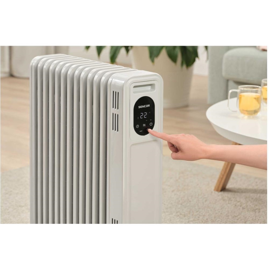 Sencor - Radiador de aceite de 13 elementos 1000/2500W/230V blanco + mando a distancia