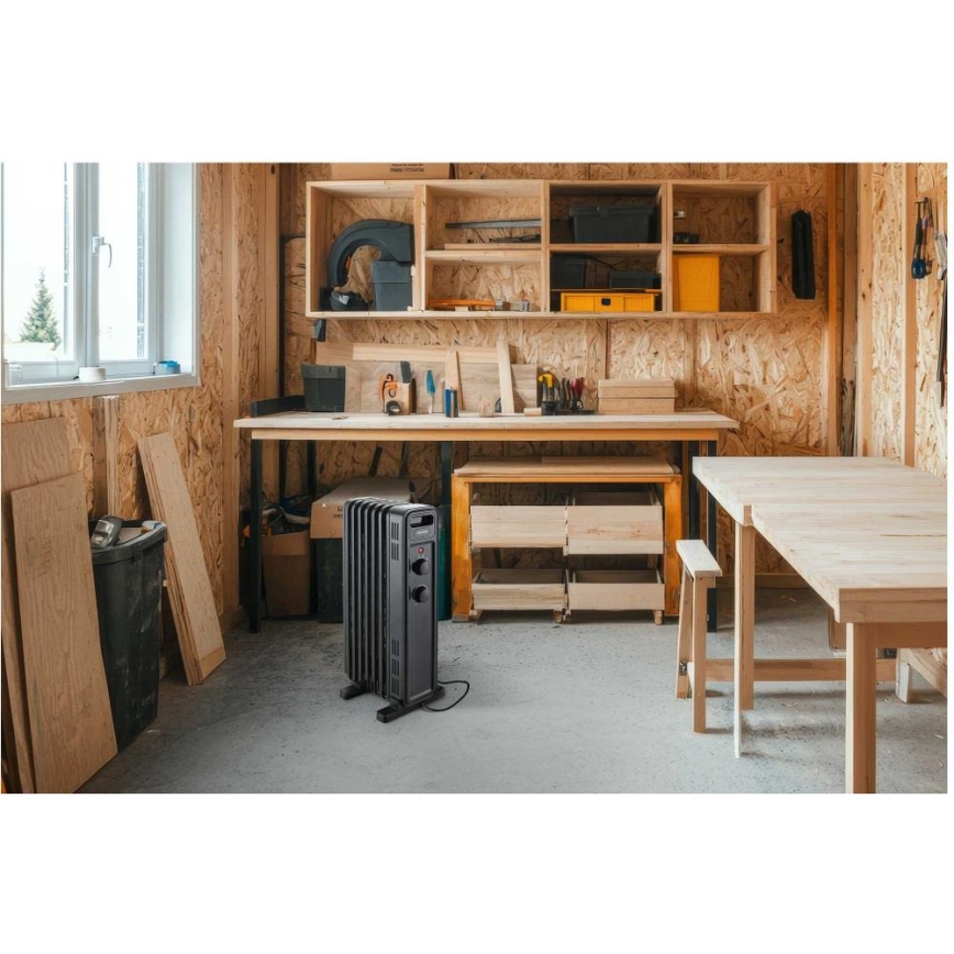 Sencor - Radiador de aceite con 7 elementos 600/900/1500W/230V negro