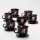 Set 6x vaso de vidrio con platillo y 1x azucarero negro ramo n° 3