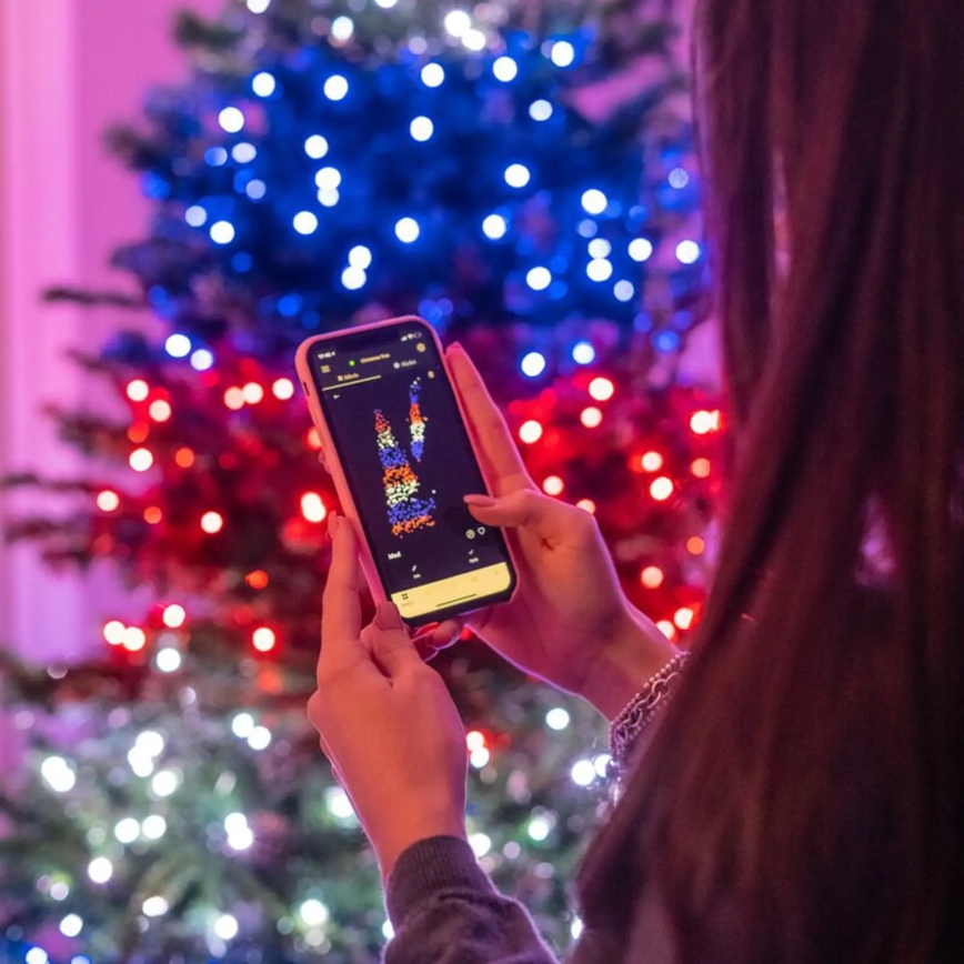 Twinkly - LED RGBW Regulable exterior Cinta de Navidad STRINGS 250xLED 23,5m IP44 Wi-Fi